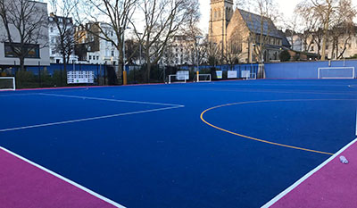 SuperCamps school holiday childcare at Pimlico Academy outdoor astro turf pitch